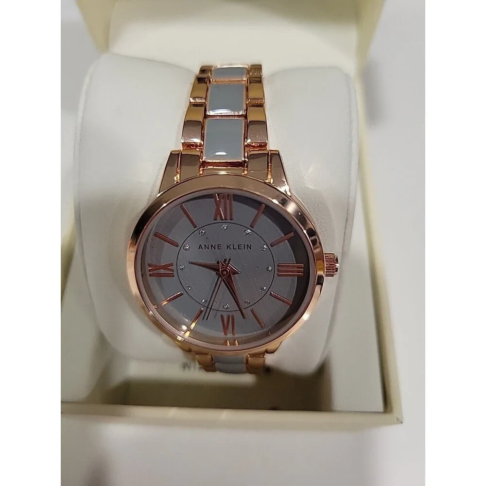 Anne Klein Women's Rose Gold-Tone and Light Pink Resin Bracelet Watch